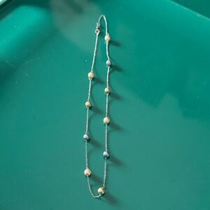 Elegant Gold and Silver Pearl Necklace